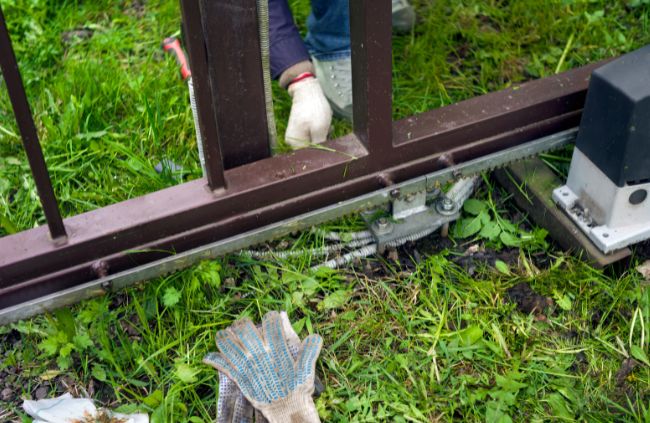 Automatic gate maintenance on a sliding gate motor and track system, part of reliable automatic gate servicing by Auto Gate Guys Melbourne Automatic gate maintenance on a sliding gate motor and track system, part of reliable automatic gate servicing by Auto Gate Guys Melbourne