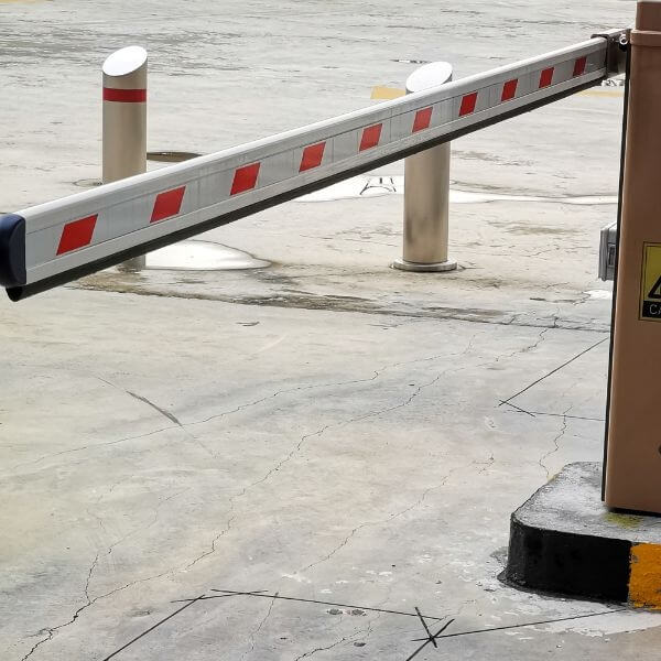 Automatic boom gate in Melbourne mounted to a wall at a commercial property by Auto Gate Guys Melbourne Automatic boom gate in Melbourne mounted to a wall at a commercial property by Auto Gate Guys Melbourne